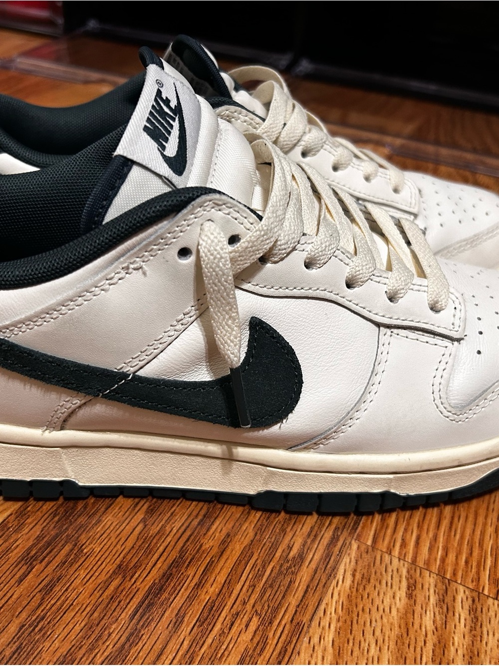 Nike Men’s Low-Top Sneakers in White and Black Swoosh